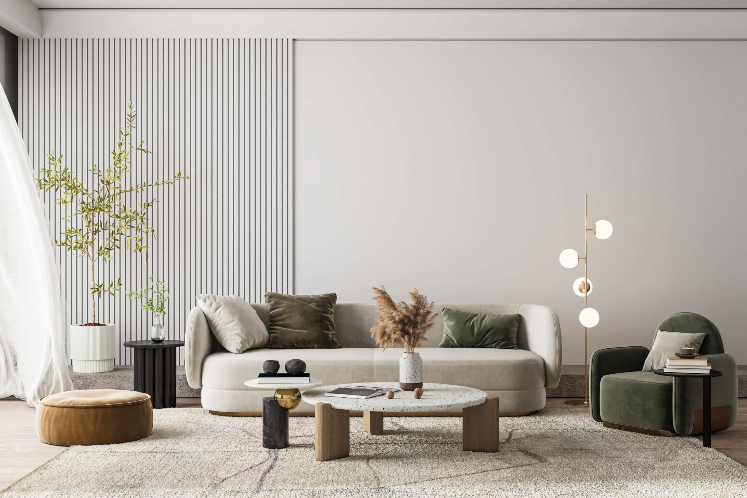 Green chair sitting in a living room with a white couch, plants, against a white wall