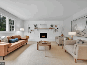 Living room with leather couch and two chairs.